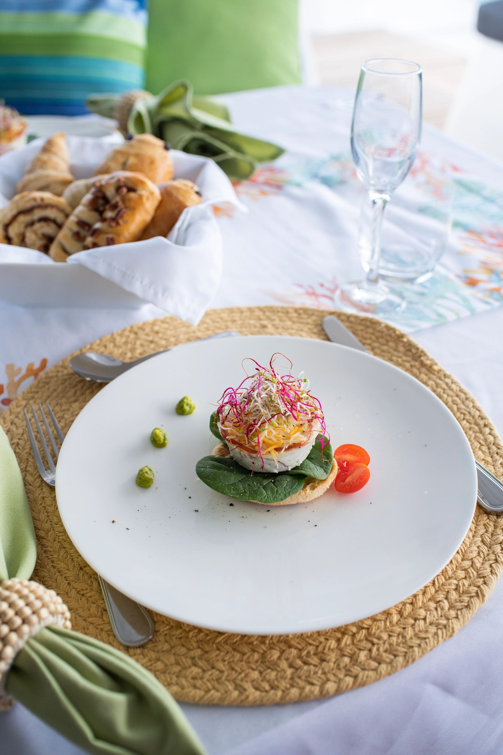 Gourmet brunch plating aboard Ripple with fresh produce and pastries