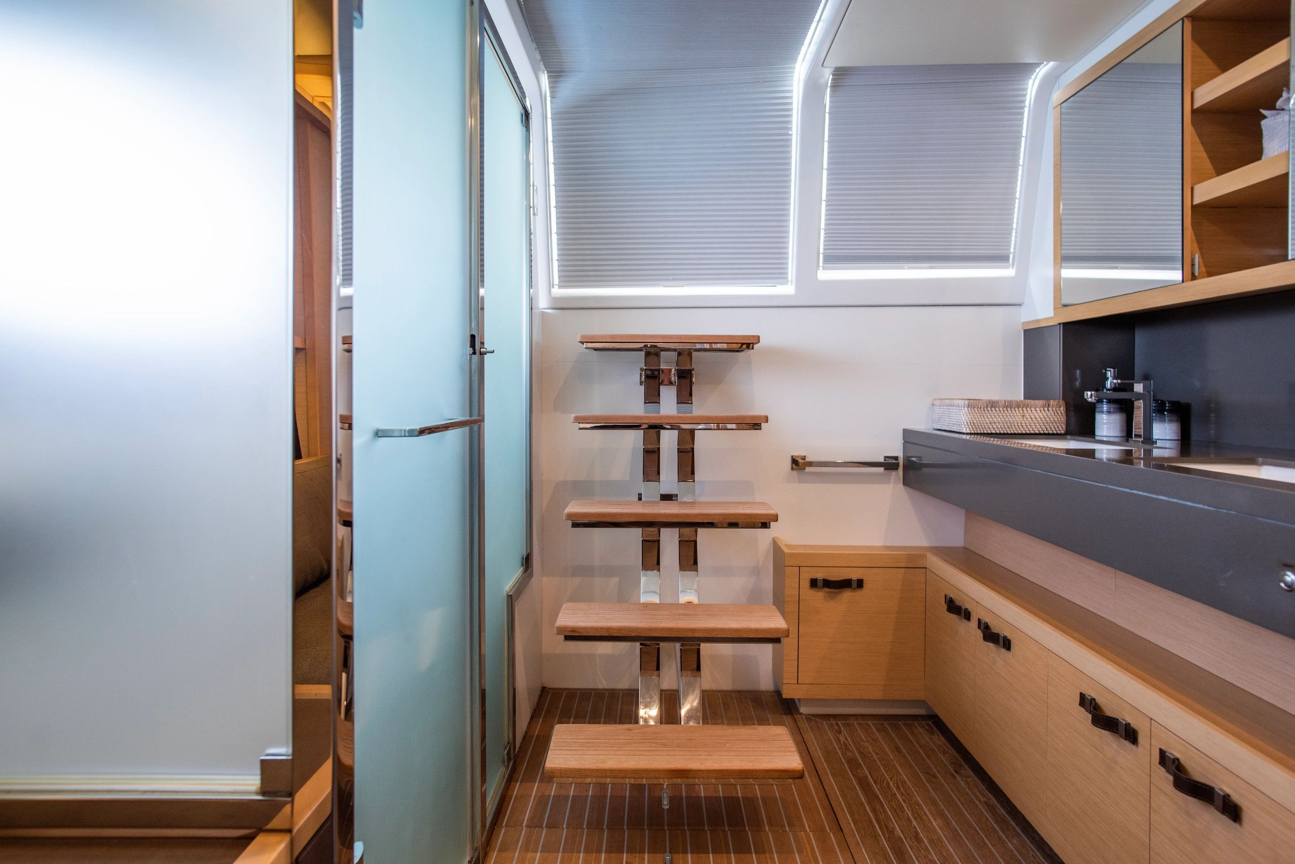 Ripple's private ensuite bathroom with warm wood finishes